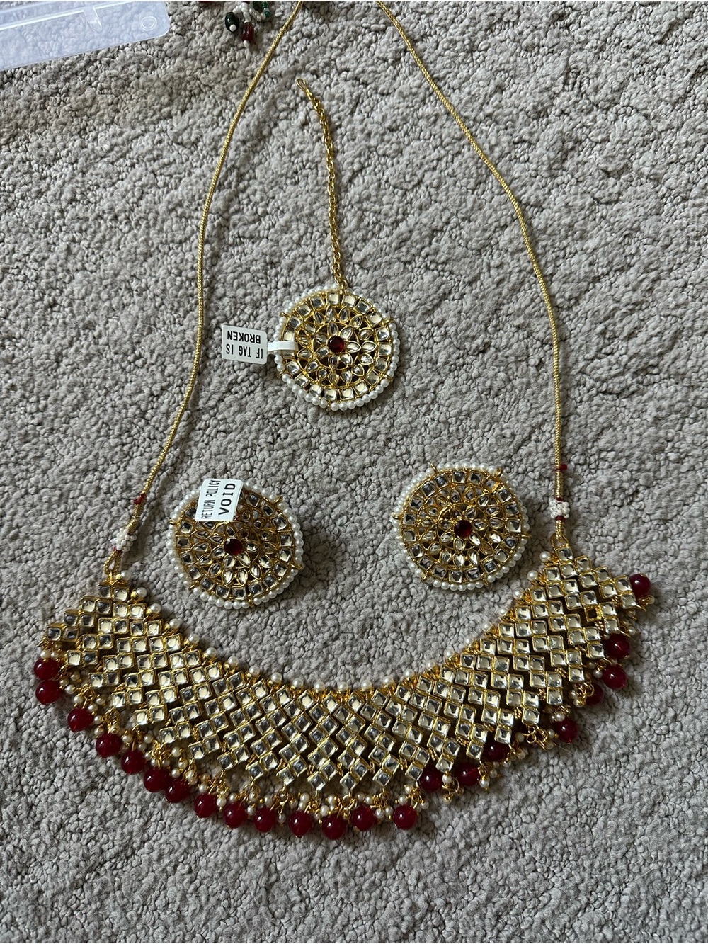 Gold and Red Kundan Necklace Set with Earrings and Maang Tikka